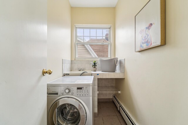 37 47th St, Weehawken, NJ 07086 - laundry room with washer / clothes dryer, tile patterned floors, and a baseboard heating unit