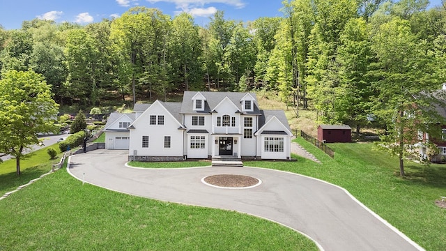 150 Mountain Ave, Pequannock Township, NJ 07444 - shingle-style home with a garage, curved driveway, and a front yard
