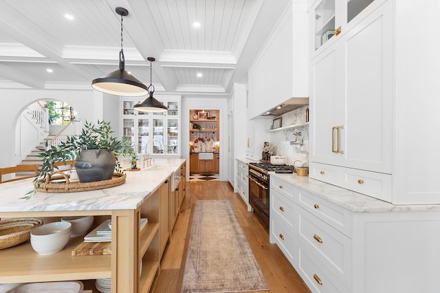 150 Mountain Ave, Pequannock Township, NJ 07444 - kitchen with range with gas stovetop, light wood-type flooring, recessed lighting, beam ceiling, and coffered ceiling