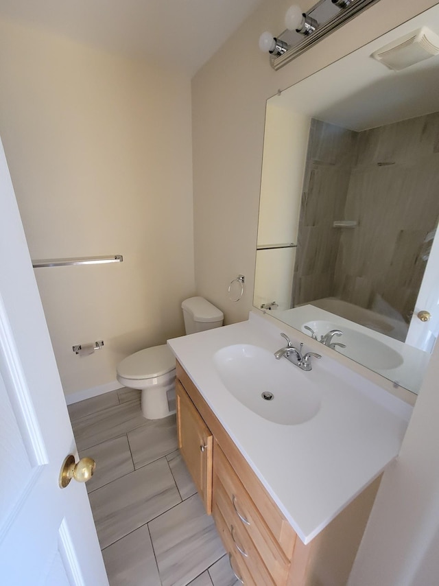 full bath with vanity, toilet, a shower, and visible vents