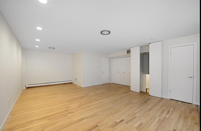 living room with light hardwood / wood-style floors