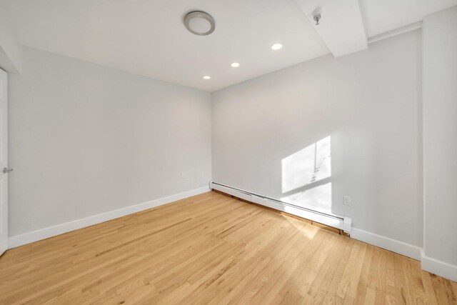 home office with wood-type flooring