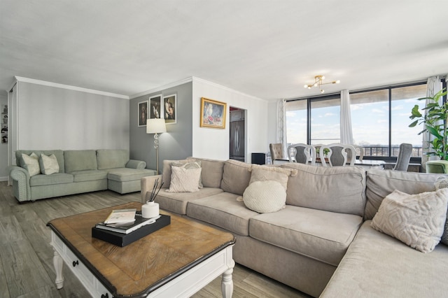 200 Winston Dr Unit 803, Cliffside Park, NJ 07010 - living area with wood finished floors, ornamental molding, and a wall of windows