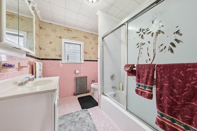 81 Atlantic St, Jersey City, NJ 07304 - full bath with radiator, vanity, wallpapered walls, enclosed tub / shower combo, and tile walls
