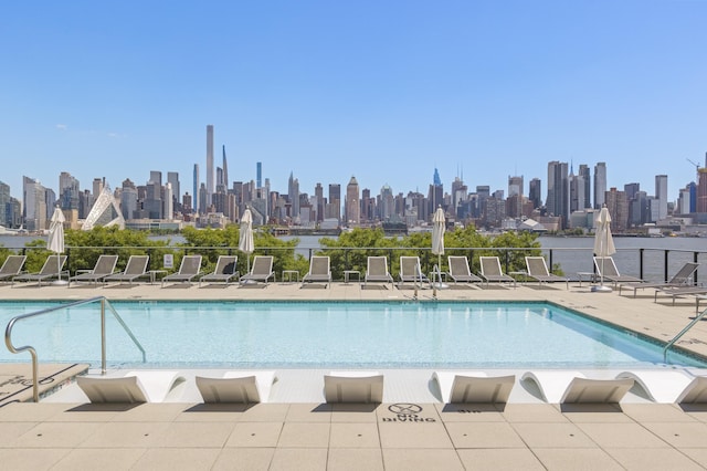 1200 Avenue At Port Imperial Unit 514, Weehawken, NJ 07086 - community pool with a view of skyline and a patio