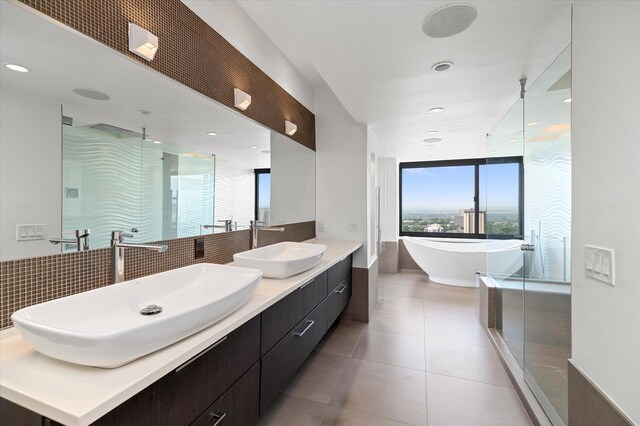 200 Old Palisade Rd Ph 4/5, Fort Lee, NJ 07024 - bathroom with a stall shower, a freestanding tub, double vanity, tile patterned flooring, and recessed lighting