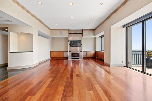 200 Old Palisade Rd Ph 4/5, Fort Lee, NJ 07024 - unfurnished living room with crown molding, light wood-style floors, and recessed lighting