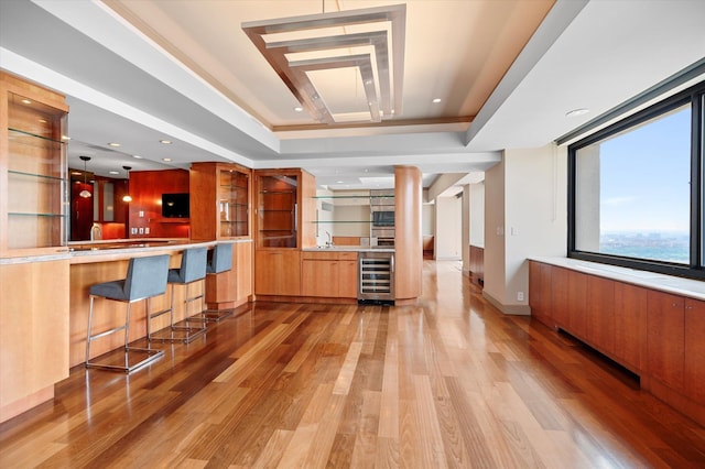 200 Old Palisade Rd Ph 4/5, Fort Lee, NJ 07024 - bar featuring beverage cooler, a tray ceiling, light wood-style floors, and double oven