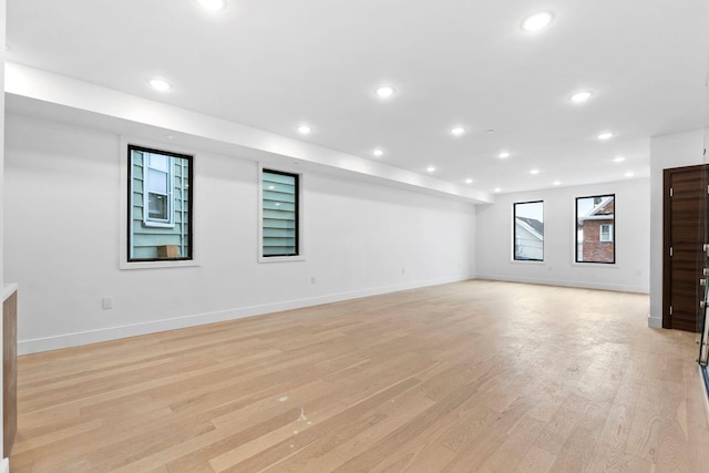 unfurnished living room with light hardwood / wood-style floors