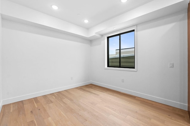 empty room with light wood-type flooring