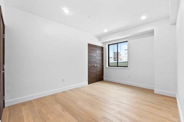 unfurnished bedroom with light hardwood / wood-style flooring