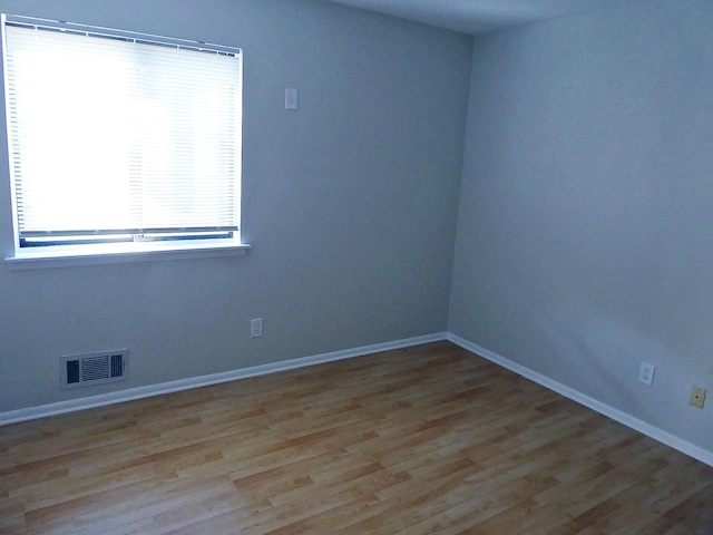 empty room featuring light hardwood / wood-style floors