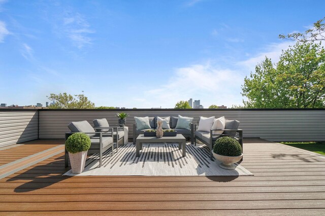 371 New York Ave Unit 2, Jersey City, NJ 07307 - wooden terrace with an outdoor living space