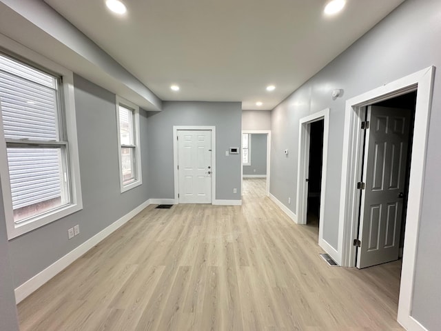 29 W 26th St, Bayonne, NJ 07002 - empty room with recessed lighting, light wood-style floors, and baseboards