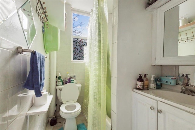 full bathroom with tile walls, vanity, shower / bath combination with curtain, and toilet