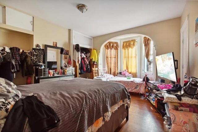 bedroom featuring dark hardwood / wood-style floors