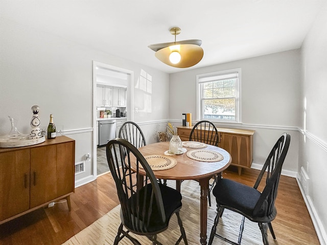 dining room featuring hardwood / wood-style flooring