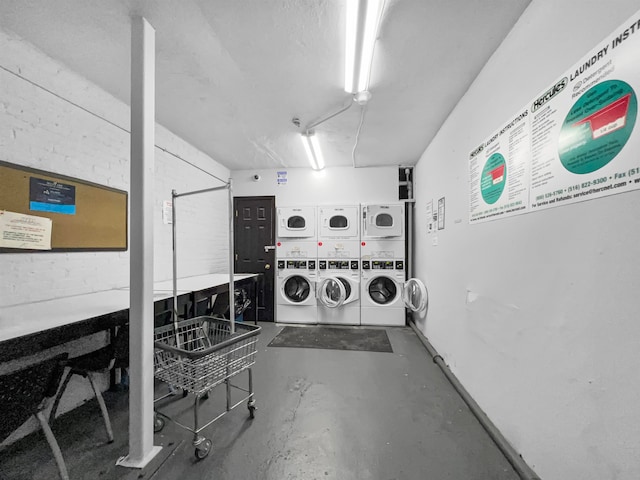 laundry room with washer and clothes dryer and stacked washer and dryer