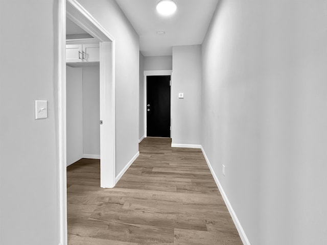 hallway featuring light hardwood / wood-style floors