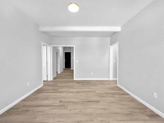 spare room featuring light hardwood / wood-style floors