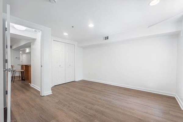 2608 Kennedy Blvd Unit 1, Union City, NJ 07087 - unfurnished bedroom featuring wood finished floors, recessed lighting, and a closet