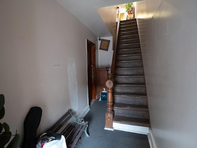 62 Hancock Ave, Jersey City, NJ 07307 - stairs featuring carpet, lofted ceiling, and baseboards