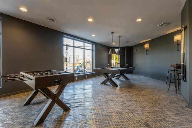 rec room with pool table and dark colored carpet