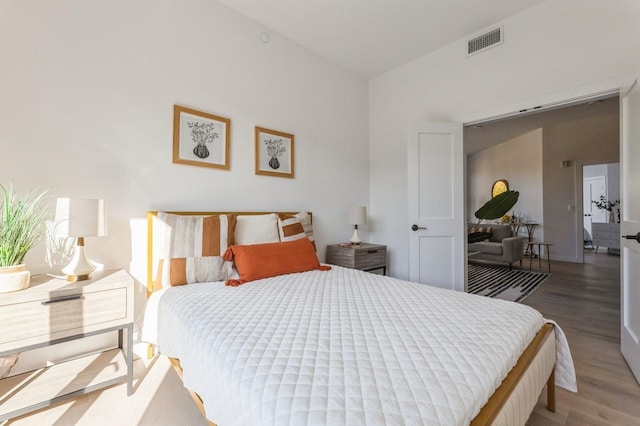 bedroom with wood-type flooring