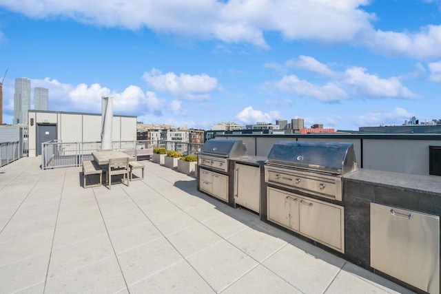 202 Merseles St Unit 503, Jersey City, NJ 07302 - view of patio with an outdoor kitchen, outdoor dining space, and a view of city