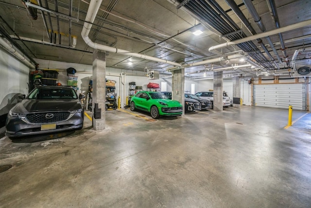 202 Merseles St Unit 503, Jersey City, NJ 07302 - parking garage featuring a garage door opener