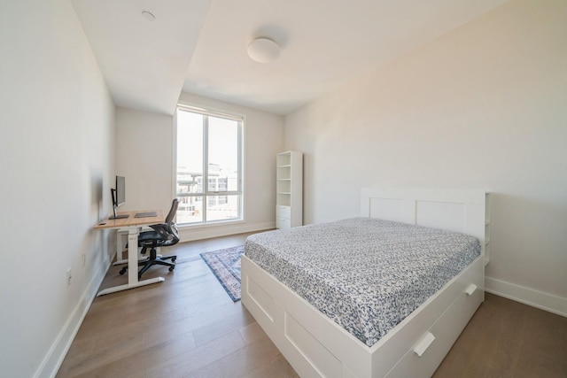 202 Merseles St Unit 503, Jersey City, NJ 07302 - bedroom with light wood-type flooring and an office area