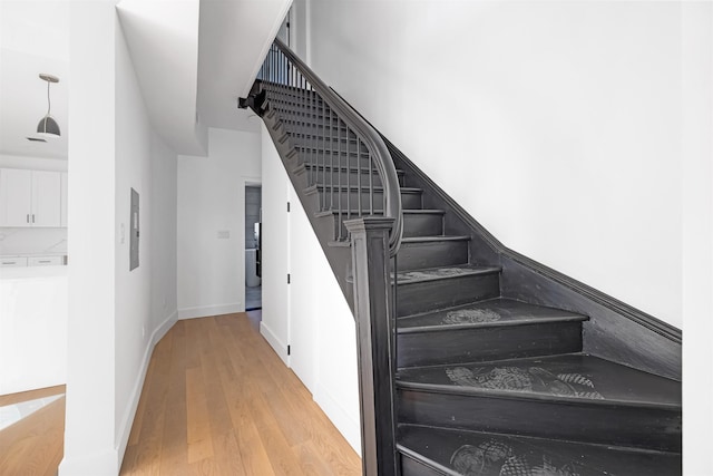 829 Boulevard, Weehawken, NJ 07086 - staircase with baseboards and wood finished floors