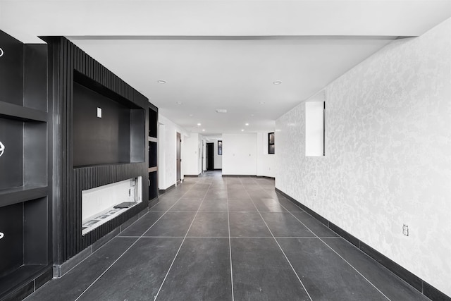 829 Boulevard, Weehawken, NJ 07086 - unfurnished room with baseboards, plenty of natural light, wood finished floors, and a water view
