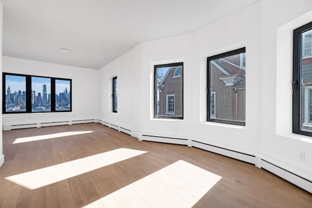 829 Boulevard, Weehawken, NJ 07086 - spare room with a view of city and light wood-type flooring