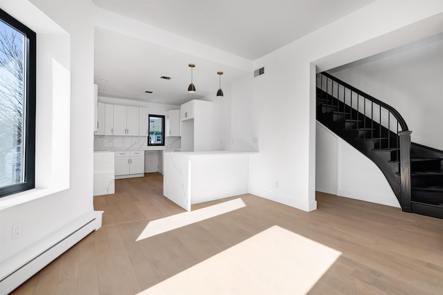829 Boulevard, Weehawken, NJ 07086 - spare room featuring a baseboard heating unit