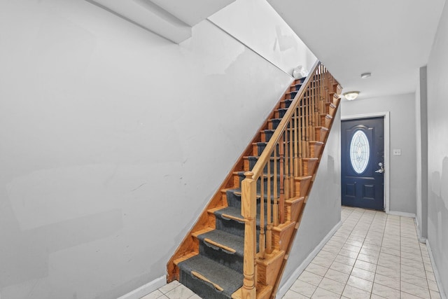 stairs featuring baseboards