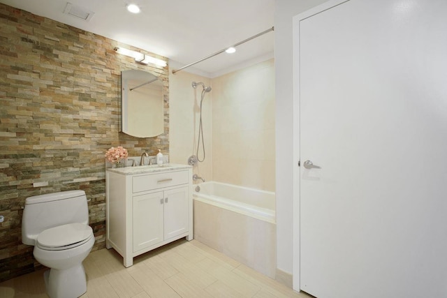 full bath featuring visible vents, toilet, vanity, and shower / tub combination