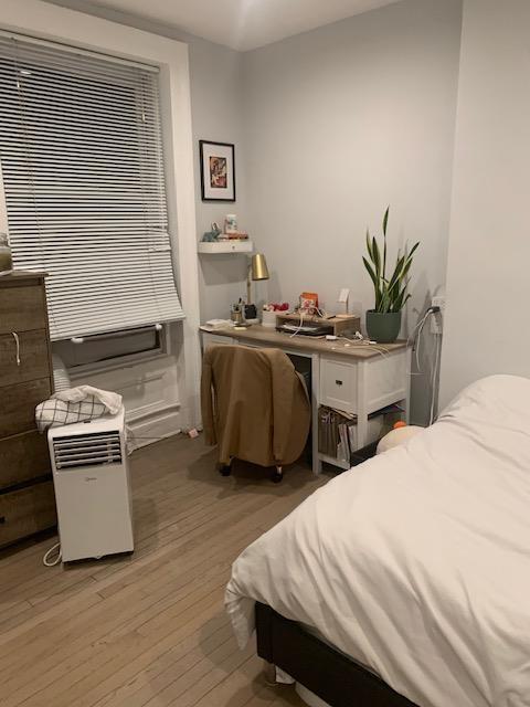 bedroom with light wood-type flooring