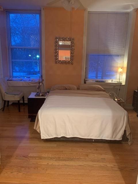 bedroom featuring light wood finished floors