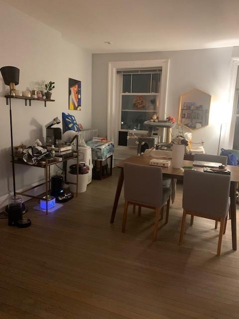 dining area featuring wood finished floors