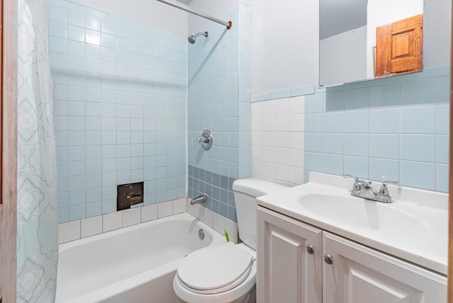 full bathroom featuring tile walls, vanity, shower / bath combination with curtain, and toilet