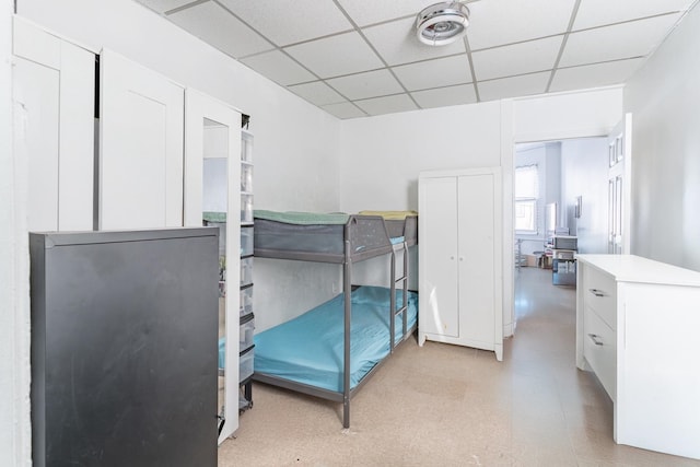 bedroom featuring a paneled ceiling