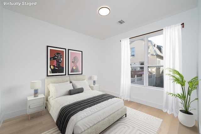 bedroom featuring light hardwood / wood-style floors