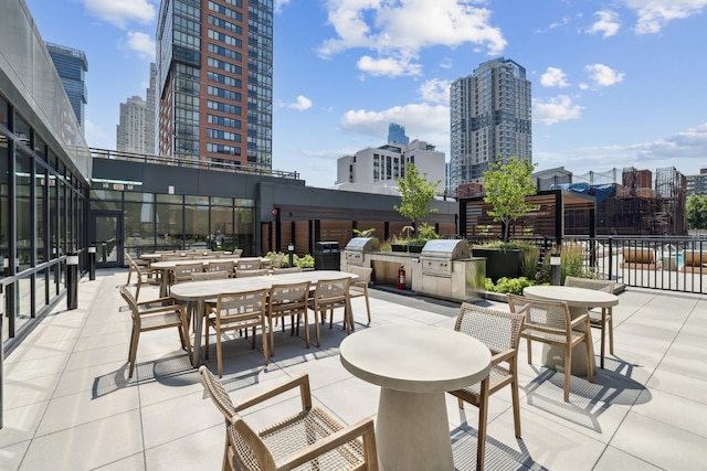 view of patio / terrace featuring an outdoor kitchen and grilling area