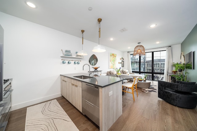 386 5th St Unit 404, Jersey City, NJ 07302 - kitchen featuring dishwasher, a peninsula, light brown cabinetry, modern cabinets, and dark wood-style floors