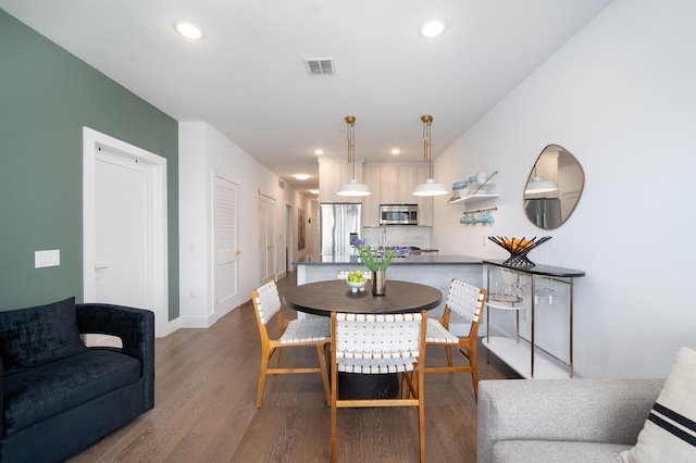 386 5th St Unit 404, Jersey City, NJ 07302 - dining space featuring wood finished floors and recessed lighting