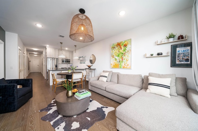 386 5th St Unit 404, Jersey City, NJ 07302 - living room featuring wood finished floors and recessed lighting