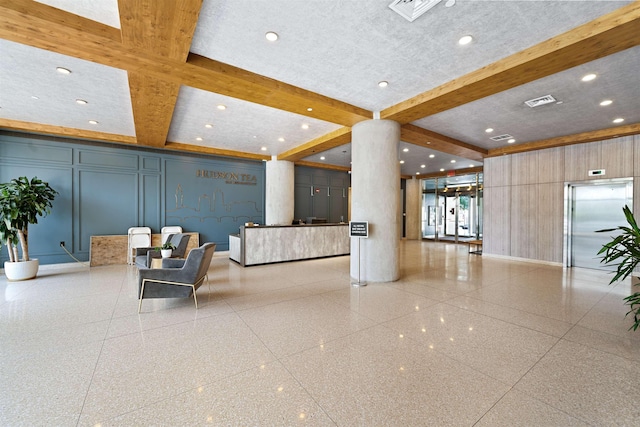 1500 Washington St Unit 8N, Hoboken, NJ 07030 - building lobby featuring a decorative wall, beam ceiling, and coffered ceiling