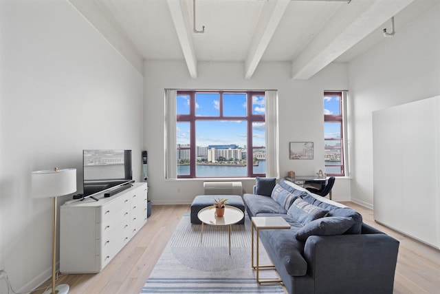 1500 Washington St Unit 8N, Hoboken, NJ 07030 - living room with beamed ceiling and light wood-type flooring