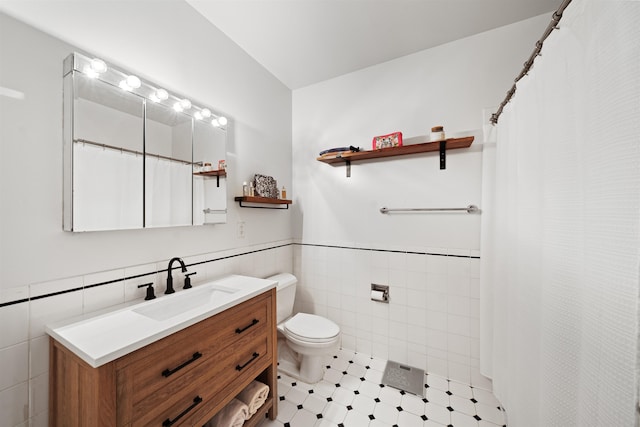 1500 Washington St Unit 8N, Hoboken, NJ 07030 - full bath featuring tile walls, vanity, wainscoting, and curtained shower